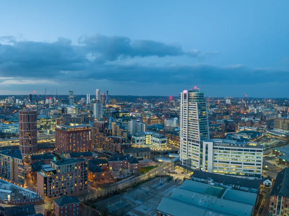 A image of the central Leeds skyline, with tall buildings mixed with lower, more historic buildings.